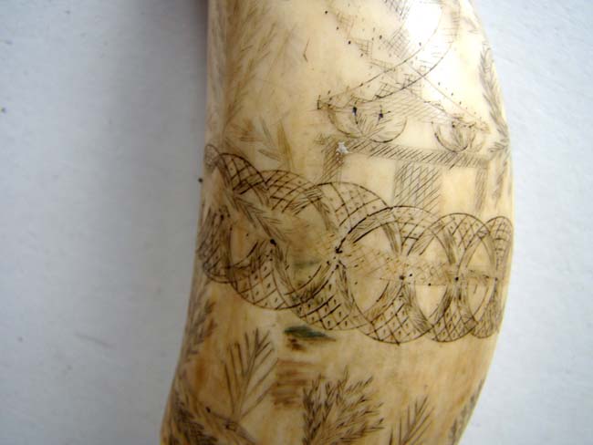 A charming 19th century Scrimshaw Whale's Tooth — image 4